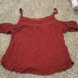 Red off the shoulder shirt